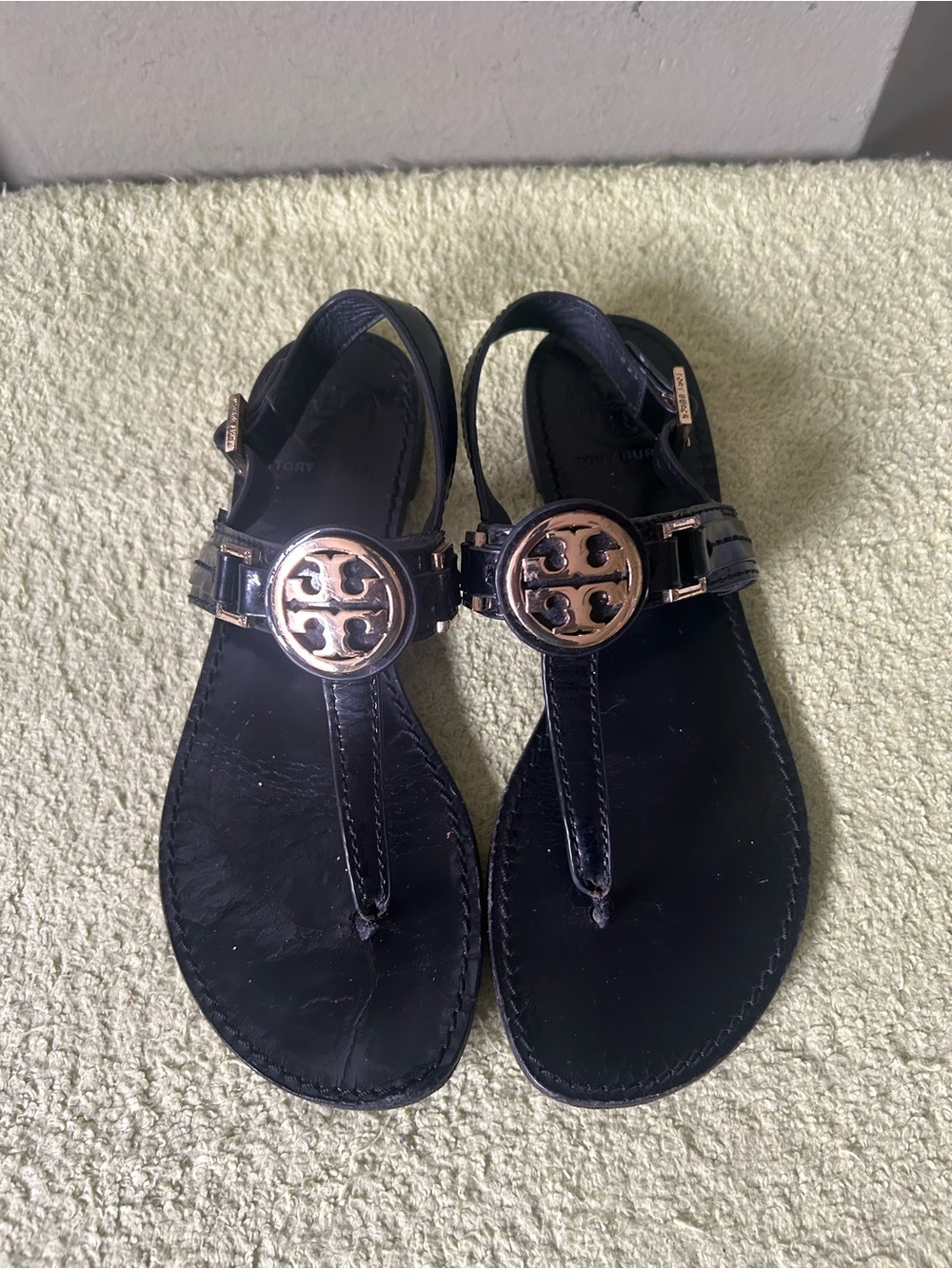 Tory Burch Black Leather Logo Thong Sandals with Gold Emblem